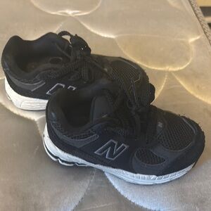 New Balance Black and White Sneakers with Mesh Upper